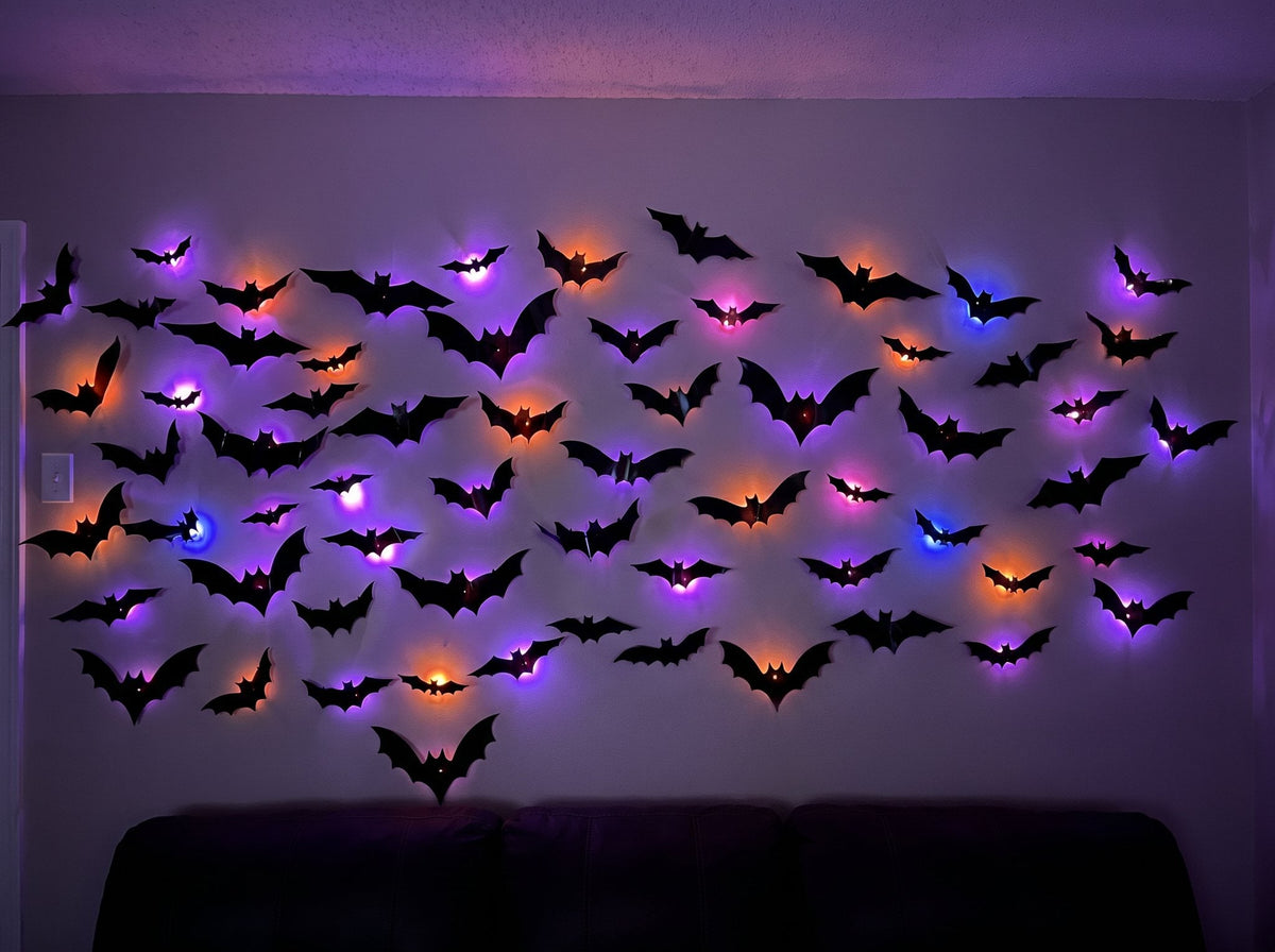 48 bats covering a full living room wall in coloured light