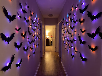 Hallway with both walls covered in glowing bats