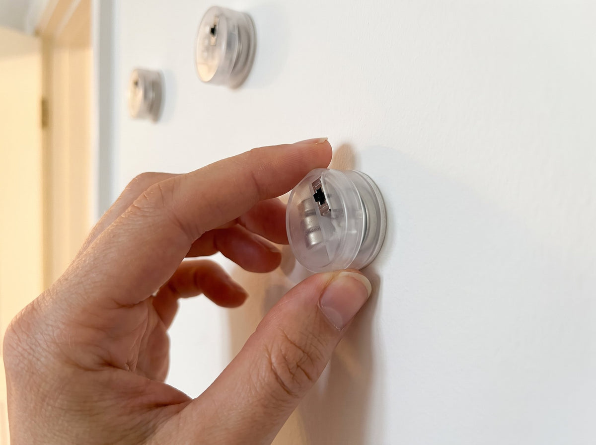 Press it on the wall